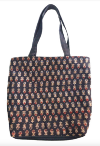 Image of a black cotton bag with geometric patterns