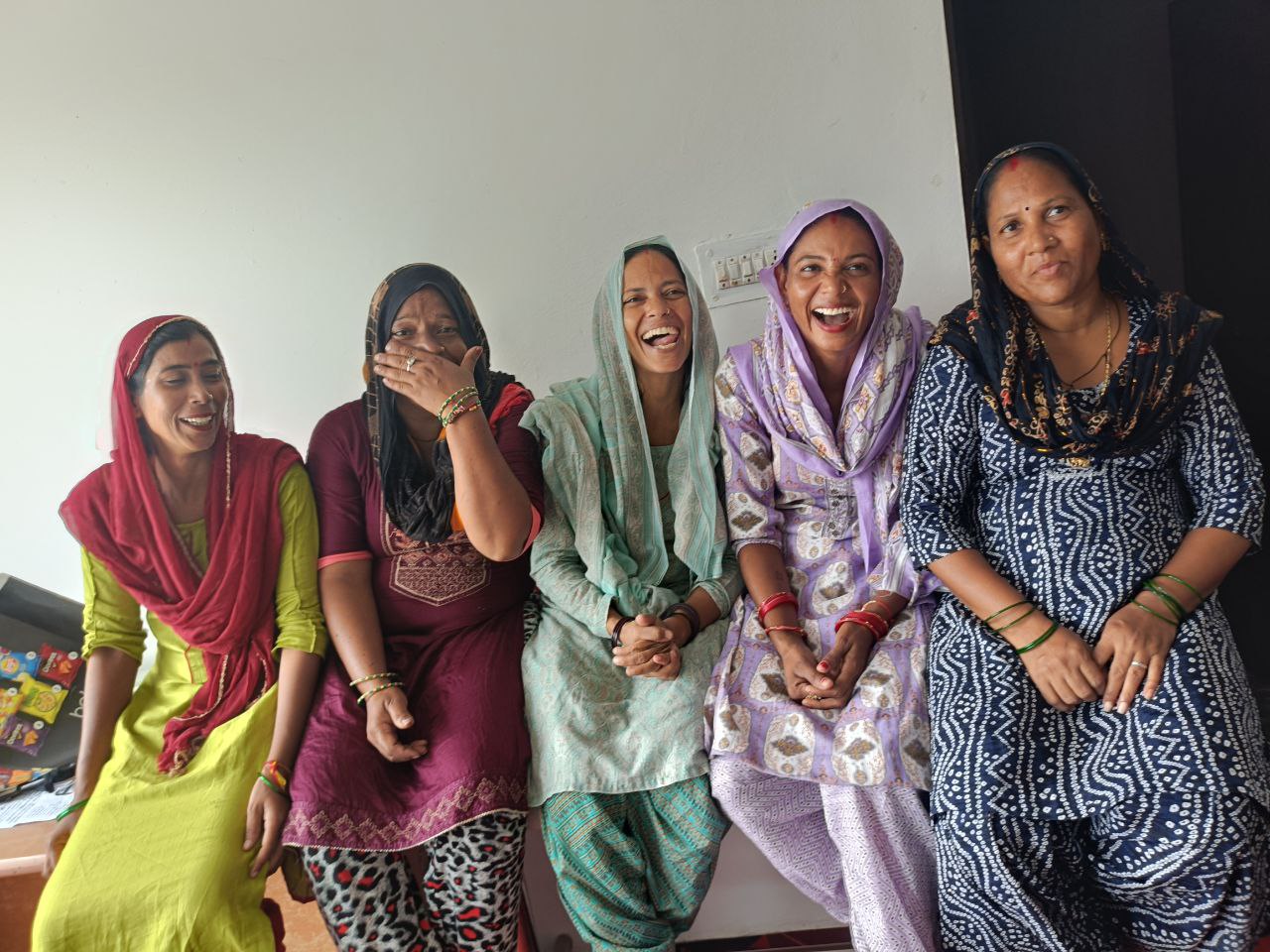 Artisans of Club Artizen partner having a light moment